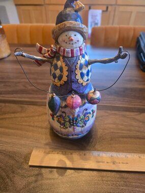 Jimmy Shore Snowman Holding Ornaments